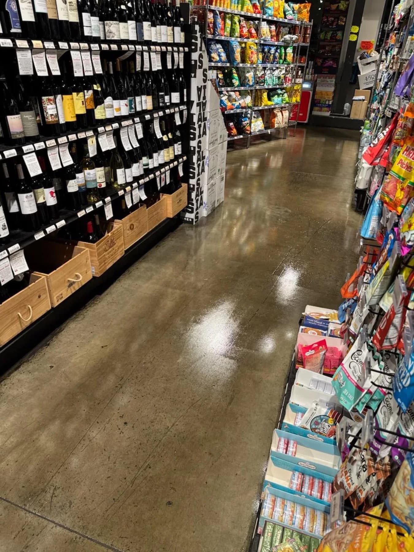 Retail wine aisle with a freshly cleaned polished concrete floor