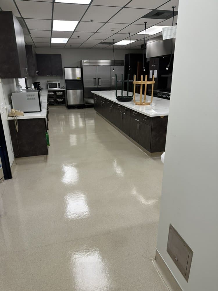 Breakroom floor stripped, waxed, and burnished to a gloss